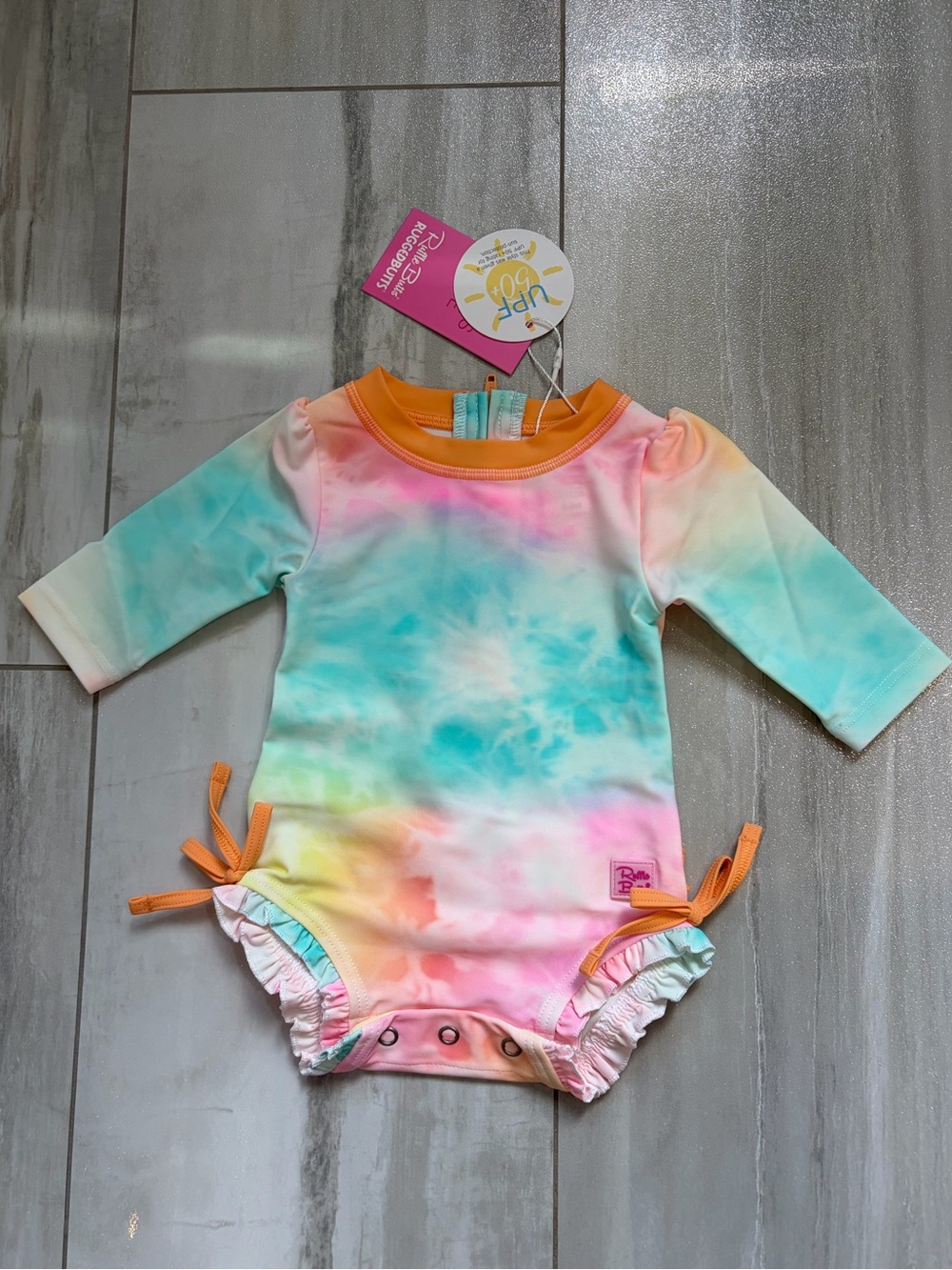 NWT RuffleButts Rainbow Tie Dye Long Sleeve Rash Guard One Piece Swimsuit, 0-3M